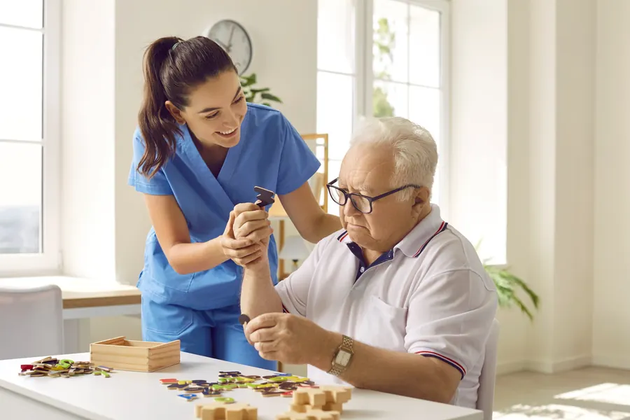 Carer supporting a person living with dementia